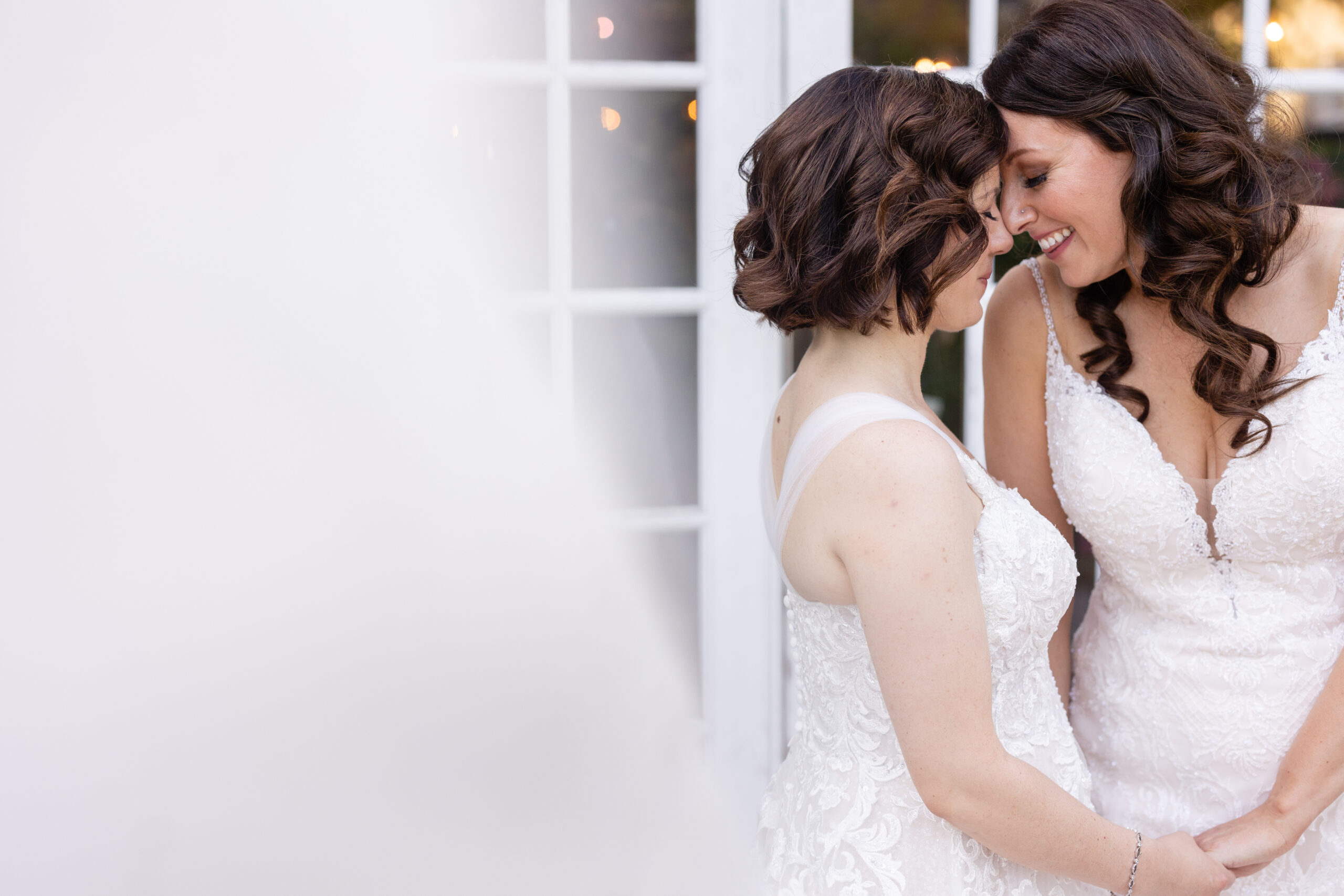 two brides embrace at their red lion inn wedding
